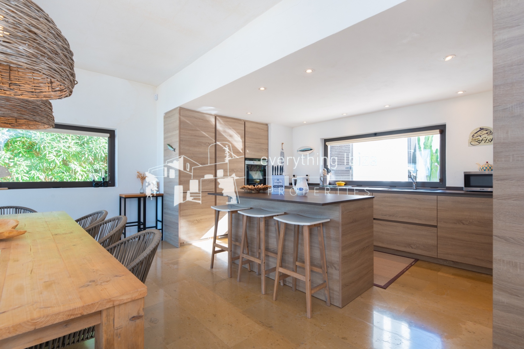 Contemporary elegance meets coastal luxury in this stunning sea-view villa with pool in Ibiza