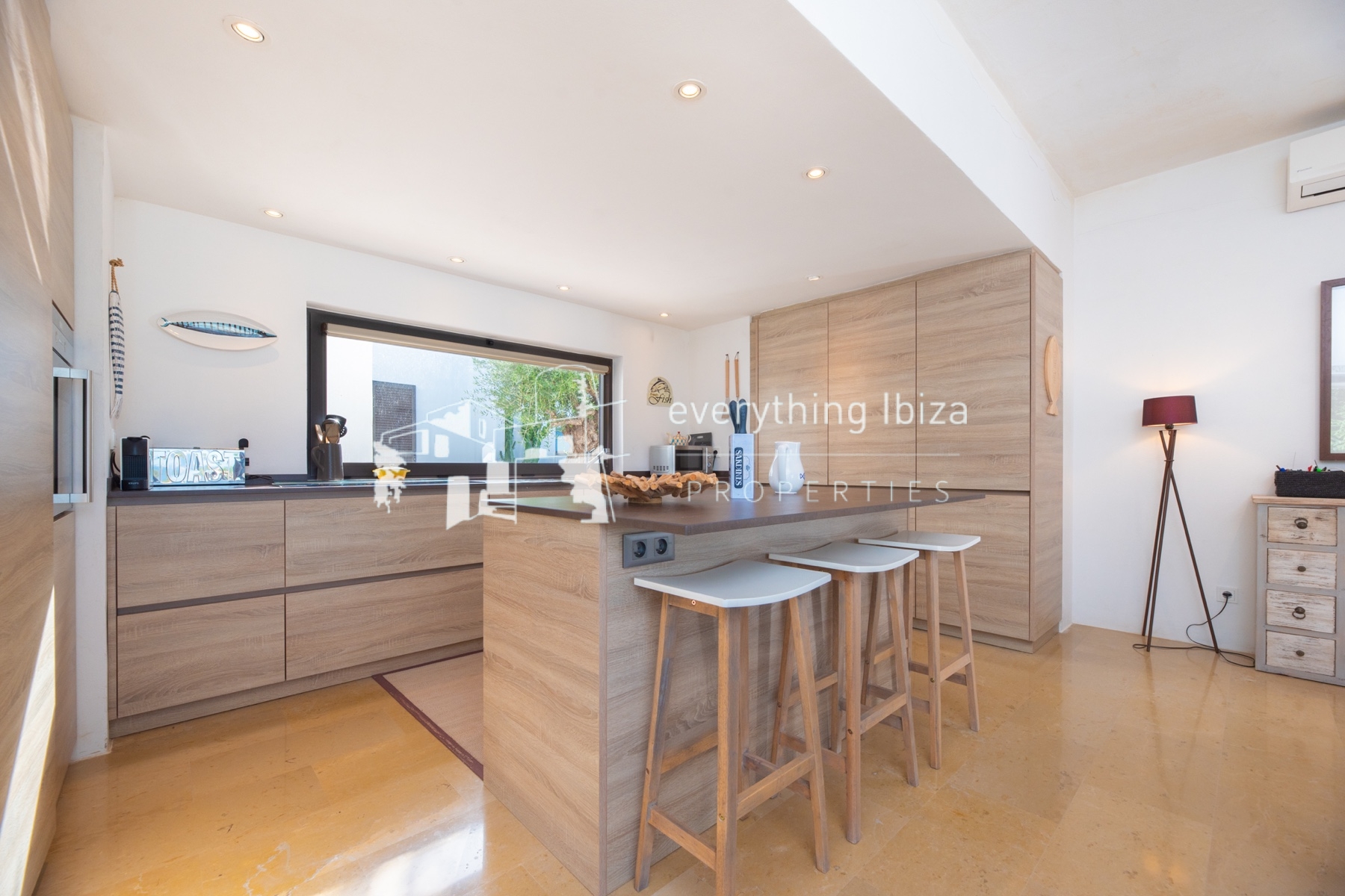 Contemporary elegance meets coastal luxury in this stunning sea-view villa with pool in Ibiza