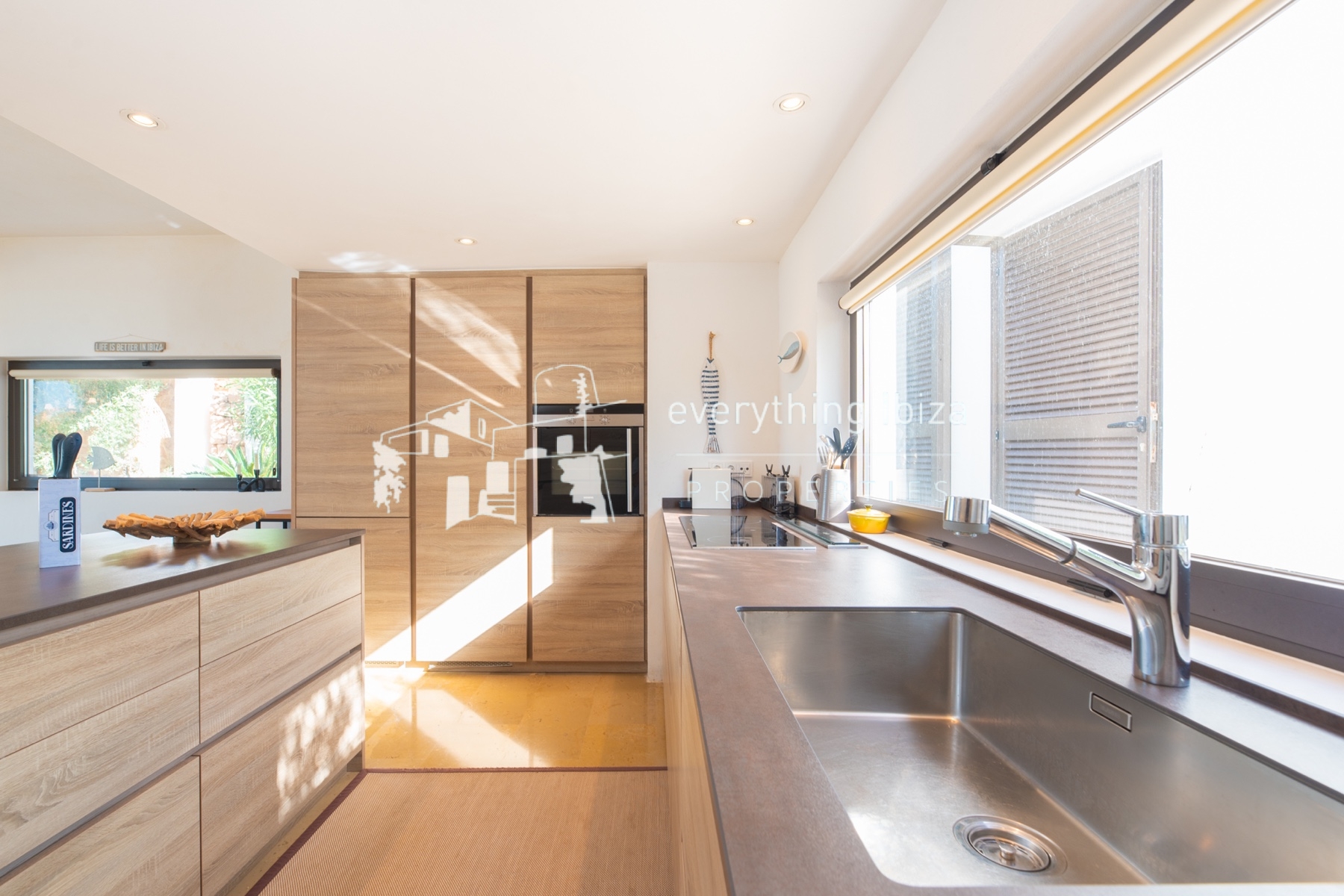 Contemporary elegance meets coastal luxury in this stunning sea-view villa with pool in Ibiza