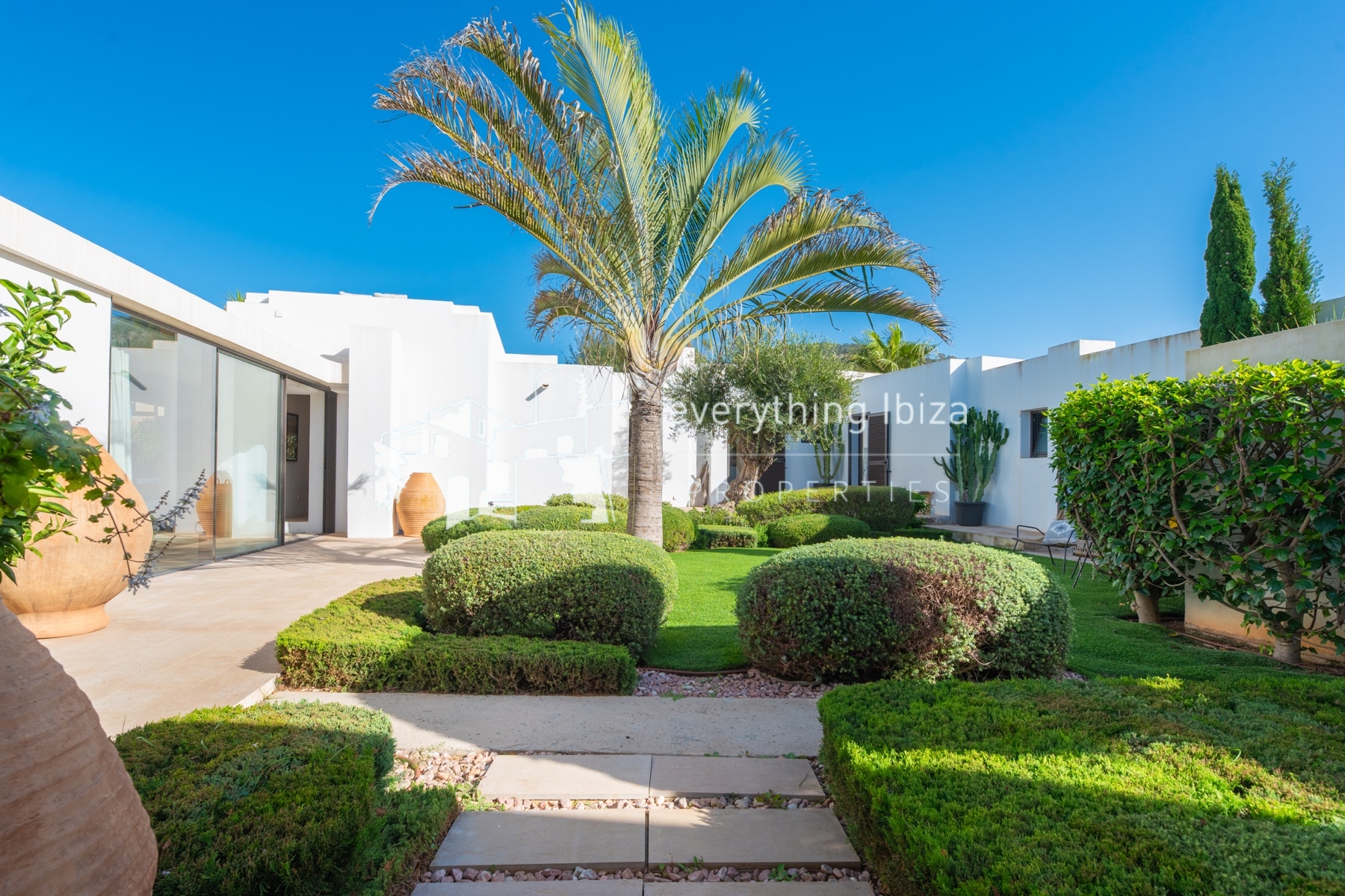 Contemporary elegance meets coastal luxury in this stunning sea-view villa with pool in Ibiza