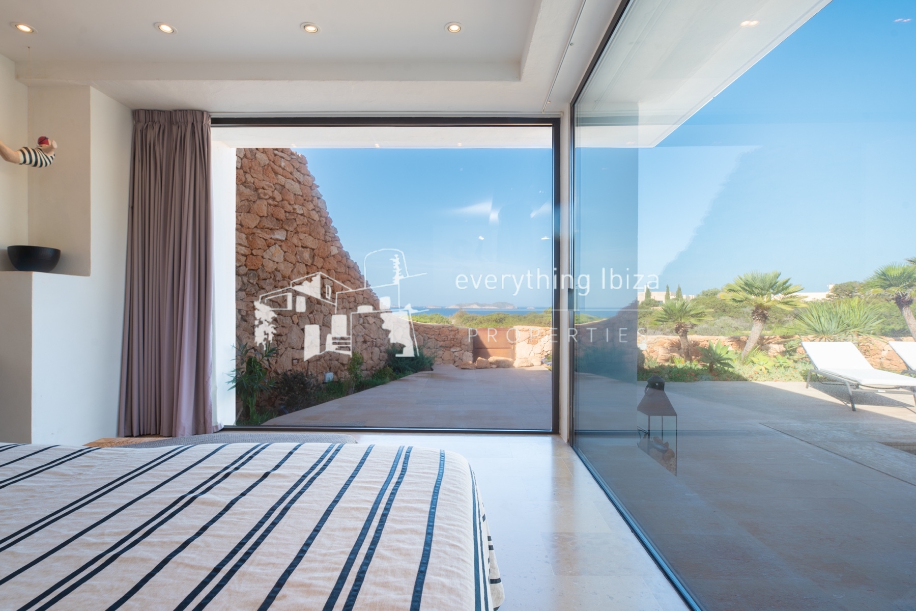 Contemporary elegance meets coastal luxury in this stunning sea-view villa with pool in Ibiza