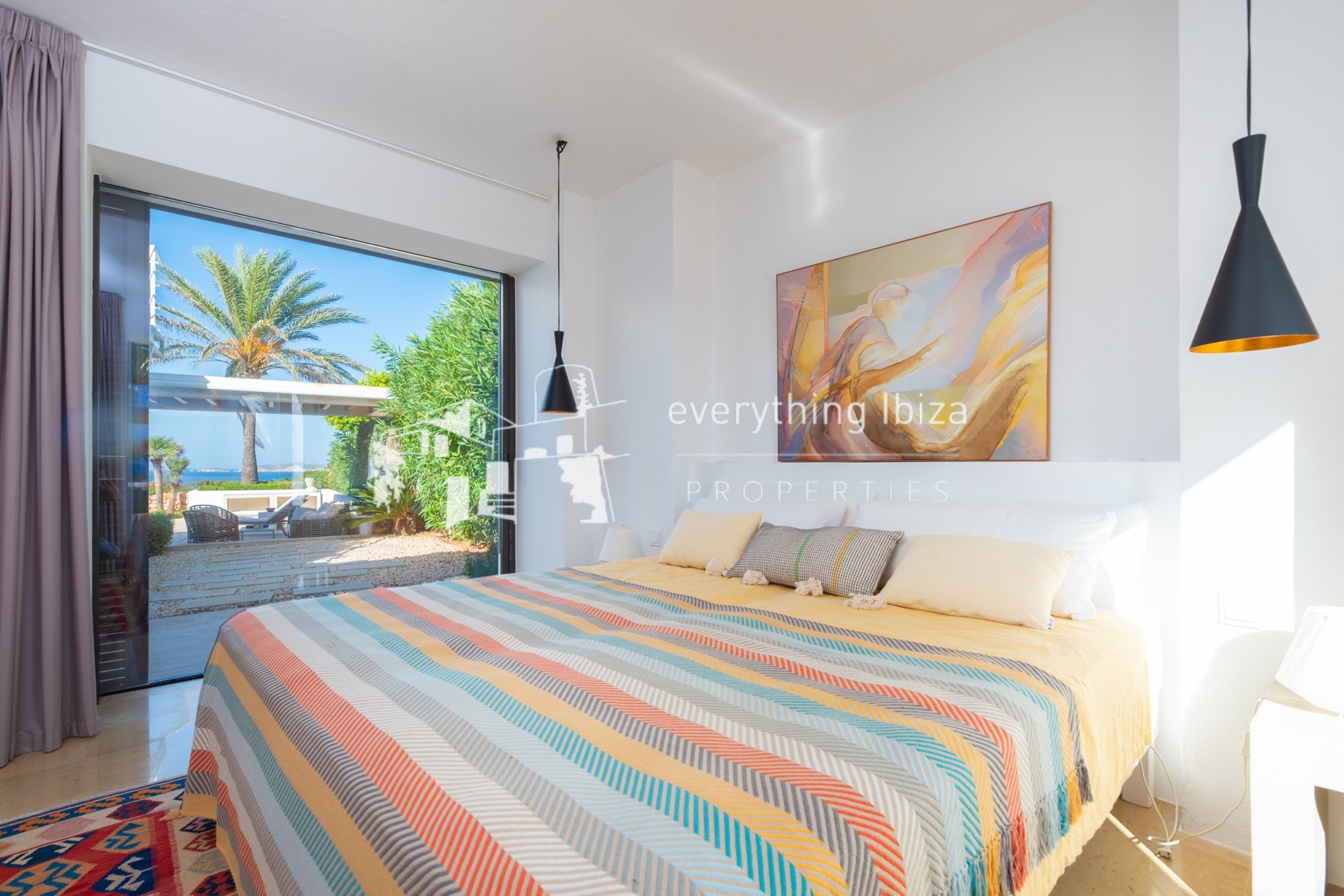 Contemporary elegance meets coastal luxury in this stunning sea-view villa with pool in Ibiza