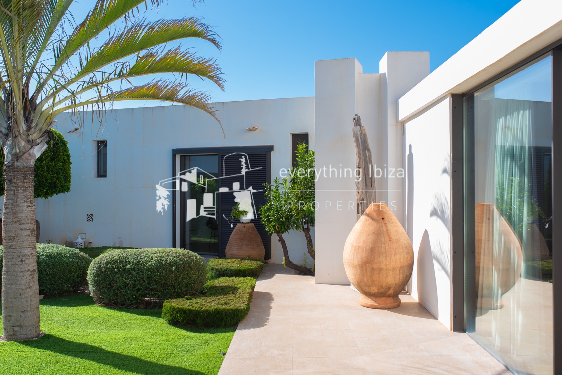 Contemporary elegance meets coastal luxury in this stunning sea-view villa with pool in Ibiza