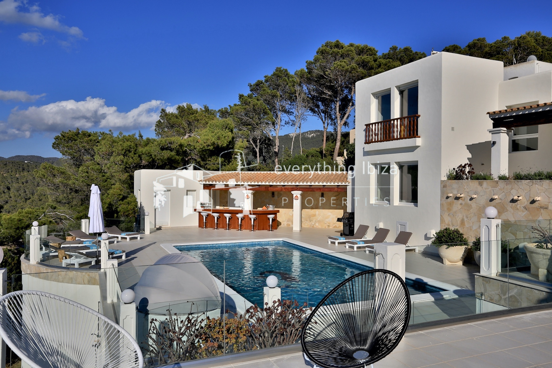 A Magnificent Elevated Villa with Private Pool Offering Stunning Sea and Sunset Views - for sale by everything ibiza Properties - ref. 1883