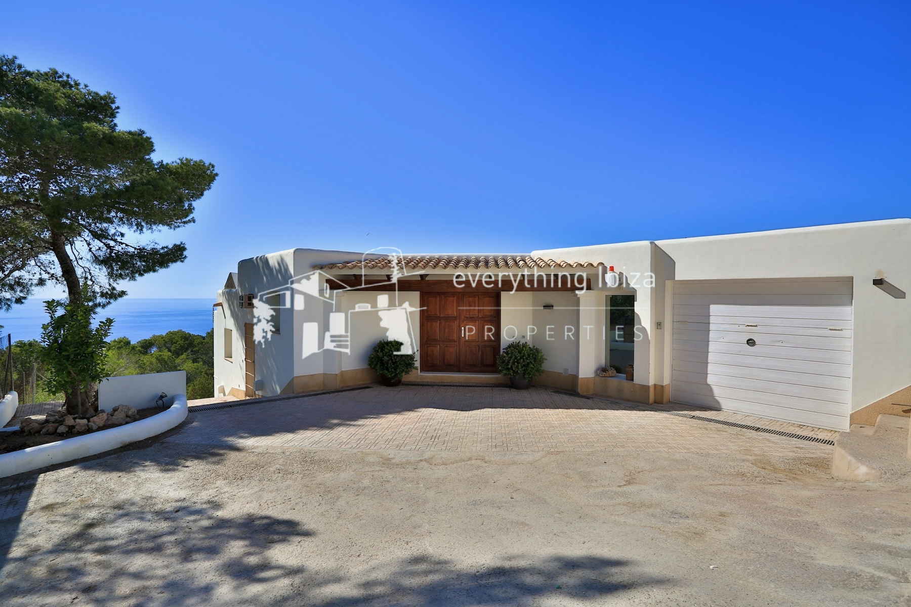 A Magnificent Elevated Villa with Private Pool Offering Stunning Sea and Sunset Views - for sale by everything ibiza Properties - ref. 1883
