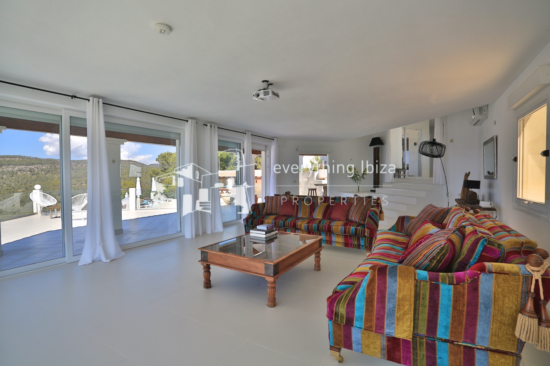 A Magnificent Elevated Villa with Private Pool Offering Stunning Sea and Sunset Views - for sale by everything ibiza Properties - ref. 1883