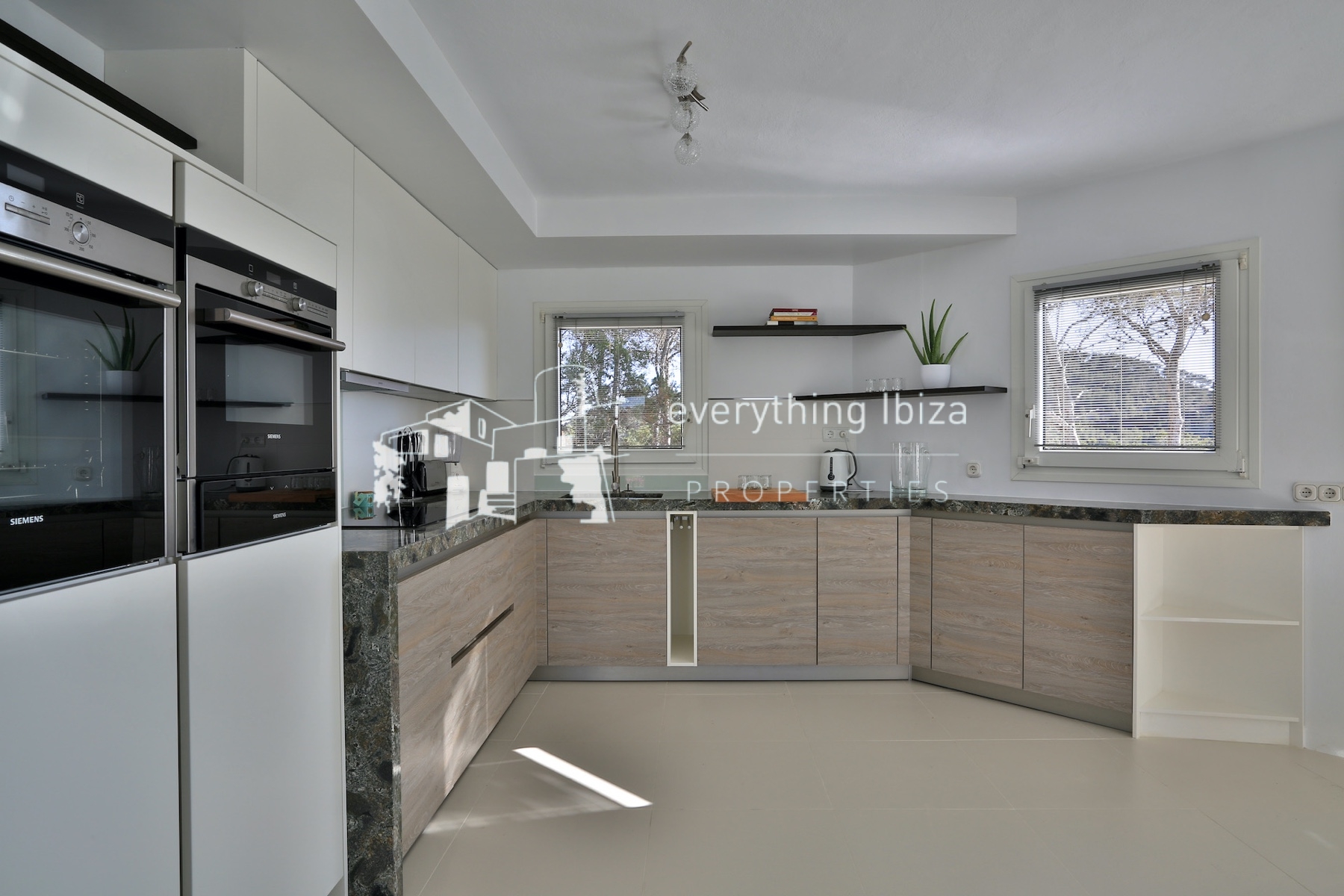 A Magnificent Elevated Villa with Private Pool Offering Stunning Sea and Sunset Views - for sale by everything ibiza Properties - ref. 1883