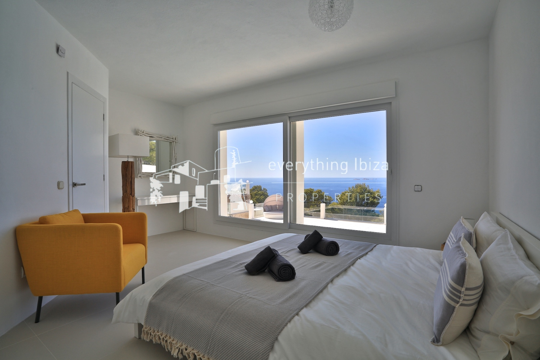 A Magnificent Elevated Villa with Private Pool Offering Stunning Sea and Sunset Views - for sale by everything ibiza Properties - ref. 1883