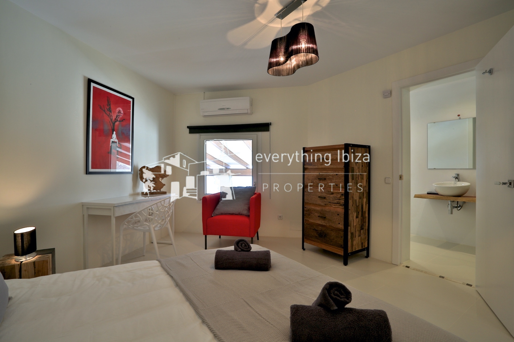 A Magnificent Elevated Villa with Private Pool Offering Stunning Sea and Sunset Views - for sale by everything ibiza Properties - ref. 1883