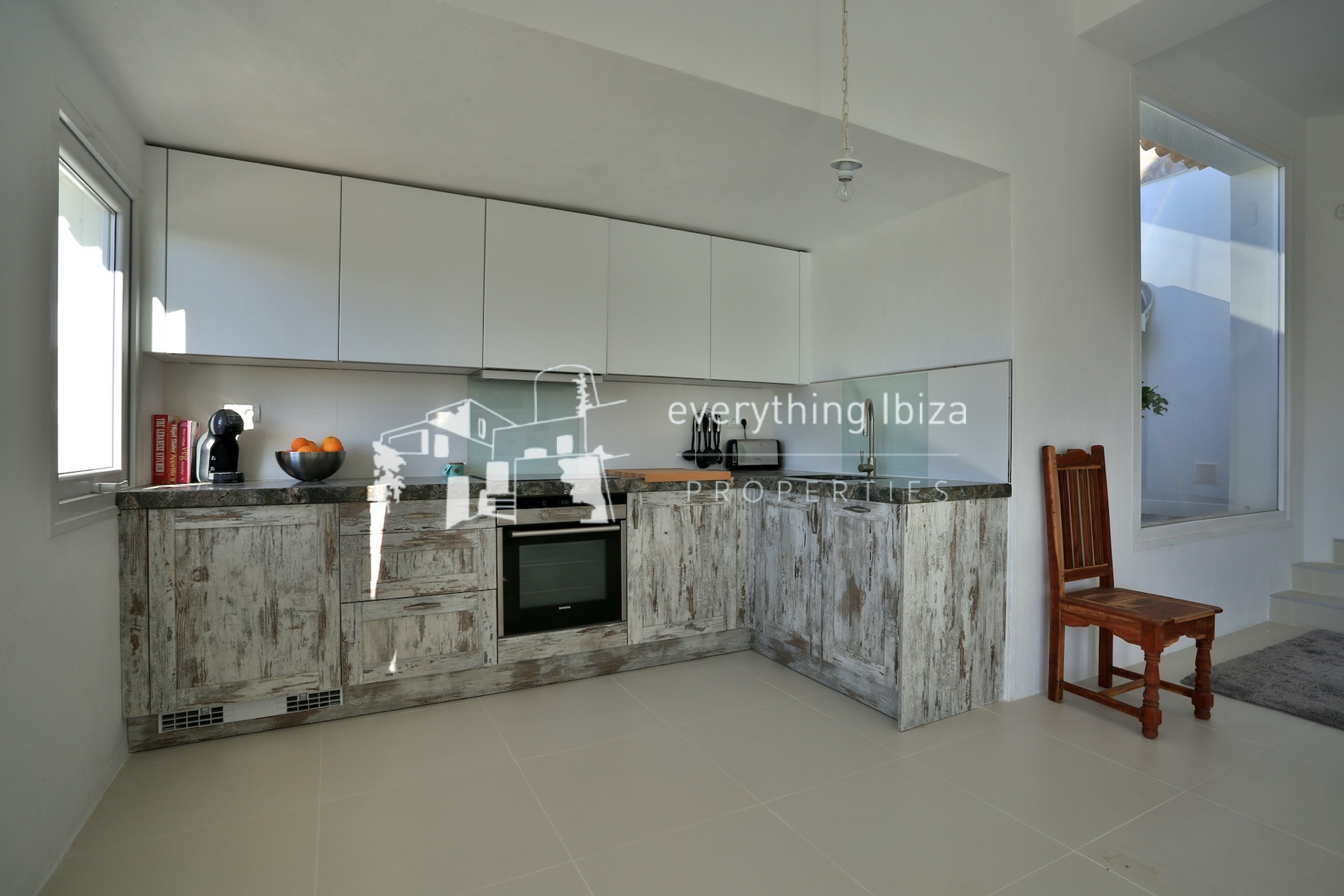 A Magnificent Elevated Villa with Private Pool Offering Stunning Sea and Sunset Views - for sale by everything ibiza Properties - ref. 1883